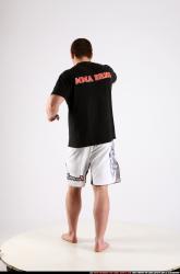 Man Adult Athletic White Fighting with knife Standing poses Sportswear