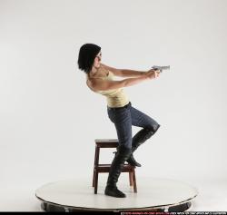 Woman Young Athletic White Fighting with gun Standing poses Casual