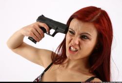 nina-sitting-pistol-pose3