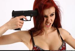 nina-sitting-pistol-pose3