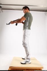 Man Adult Muscular White Fighting with submachine gun Standing poses Casual