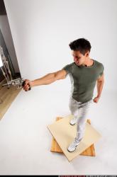 lukas-standing-shooting-revolver