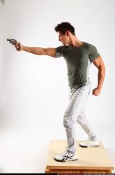 lukas-standing-shooting-revolver