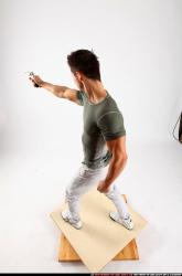 lukas-standing-shooting-revolver