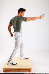 lukas-standing-shooting-revolver