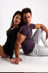 Man & Woman Adult Athletic White Holding Sitting poses Casual