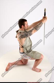 2014 03 ALEX PREHISTORIC SWORD POSE2 02 A