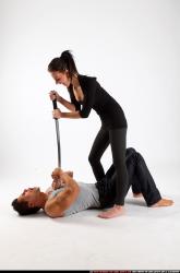 Man & Woman Adult Athletic White Fighting with sword Fight Casual