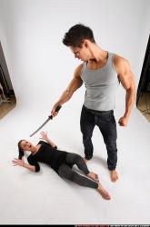 Man & Woman Adult Athletic White Fighting with sword Perspective distortion Casual