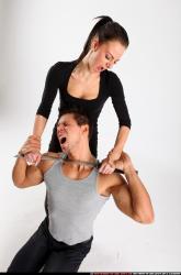 Man & Woman Adult Athletic White Fighting with sword Execution Casual