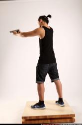 Jerald-mob-standing-aiming-pistol