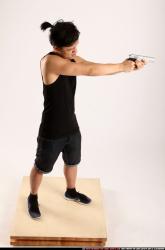 Jerald-mob-standing-aiming-pistol