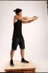 Jerald-mob-standing-aiming-pistol