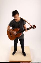 Jerald-playing-guitar