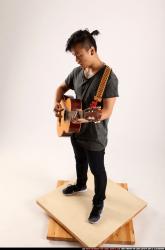 Jerald-playing-guitar
