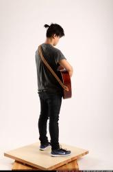 Jerald-playing-guitar
