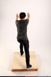 Jerald-standing-pushing