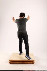 Jerald-standing-pushing