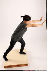 Jerald-standing-pushing