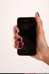 katerinerine-holding-smartphone-close-up