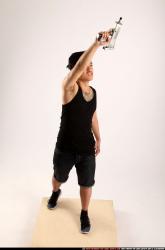 Jerald-mob-standing-raising-uzi