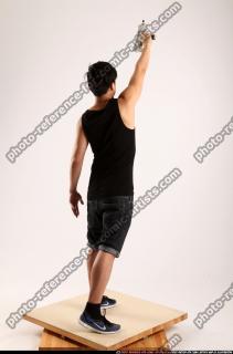 2014 08 JERALD MOB STANDING RAISING UZI 05 B