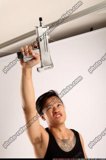 2014 08 JERALD MOB STANDING RAISING UZI 08