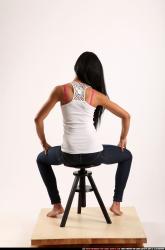 Woman Young Athletic Daily activities Sitting poses Casual Latino