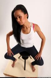 Woman Young Athletic Daily activities Sitting poses Casual Latino