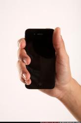 Jerald-holding-smartphone-close-up