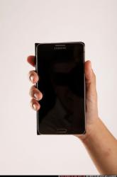Jerald-holding-smartphone-close-up