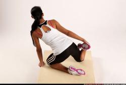 Woman Young Athletic Fitness poses Kneeling poses Sportswear Latino