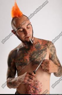 2014 12 EDGAR KNIFE CIGARETTE POSES 00