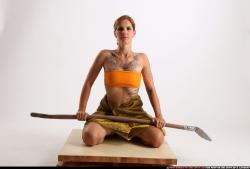 Woman Adult Athletic White Fighting with spear Sitting poses Army
