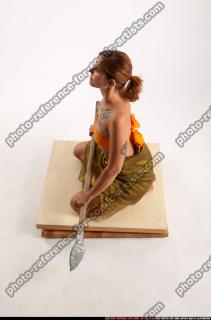 2014 12 AMY PREHISTORIC SITTING NEUTRAL POSE SPEAR 02 A