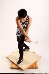 keiji-sword-swing-back