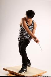 keiji-sword-swing-back