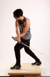 keiji-sword-swing-back