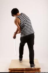 keiji-sword-swing-back