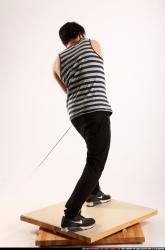 keiji-sword-swing-back