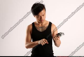 2014 12 JERALD MOB RELOADING UZI 00