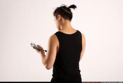 Jerald-mob-reloading-uzi