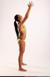 Woman Young Athletic Throwing Standing poses Sportswear Latino
