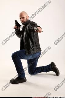 2015 01 ROSS DUAL PISTOLS POSE2 00