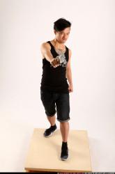 Jerald-mob-aiming-uzi