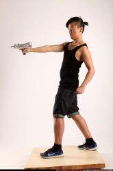 Jerald-mob-aiming-uzi