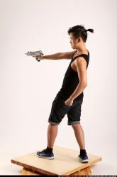 Jerald-mob-aiming-uzi