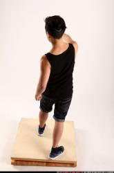 Jerald-mob-aiming-uzi