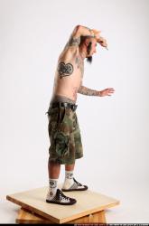 edgar-knife-stab-pose1