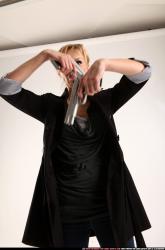 rachel-drawing-pistols-coat